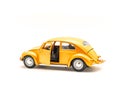 Studio shot small orange toy car with open door isolated on whit Royalty Free Stock Photo