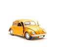 Studio shot small orange toy car with open door isolated on whit Royalty Free Stock Photo