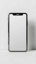 Studio Shot of a Smartphone with Blank Screen Isolated on White Background Perfect for Mockups and Digital Design Royalty Free Stock Photo