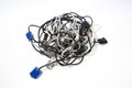 Tangled cables over white background Royalty Free Stock Photo