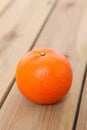 Citrus tankan against wooden background