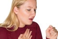 Studio Shot Of Young Woman Suffering With Cough