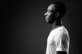 Profile view portrait of young African man in black and white Royalty Free Stock Photo