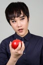 Face of young androgynous Asian transgender woman