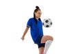 Studio shot of young female soccer, football player workout isolated on white studio background. Sport, action, motion Royalty Free Stock Photo