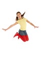 Studio Shot Of Young Girl Jumping In Air Royalty Free Stock Photo