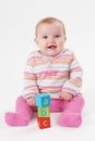 Studio Shot Of Young Girl Playing With Alphabet Blocks Royalty Free Stock Photo