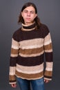 Young androgynous man with long hair ready for winter Royalty Free Stock Photo