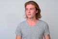 Young handsome man with long blond hair Royalty Free Stock Photo