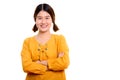 Studio shot of young happy Asian woman smiling with arms crossed Royalty Free Stock Photo