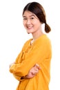 Studio shot of young happy Asian woman smiling with arms crossed Royalty Free Stock Photo