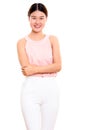 Studio shot of young happy Asian woman smiling with arms crossed Royalty Free Stock Photo