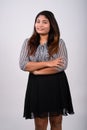 Studio shot of young happy fat Persian businesswoman smiling whi Royalty Free Stock Photo