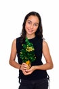 Studio shot of young happy teenage girl holding Happy New Year tree isolated against white background Royalty Free Stock Photo