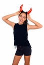 Studio shot of young happy teenage girl ready for Halloween isolated against white background Royalty Free Stock Photo