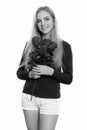 Studio shot of young happy teenage girl smiling while holding roses ready for Valentine`s day Royalty Free Stock Photo