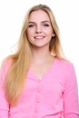 Studio shot of young happy teenage girl smiling Royalty Free Stock Photo