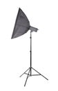 A studio softbox isolated on a white background. A professional studio equipment. A dark flashlight on a tall tripod. Outbreak. Royalty Free Stock Photo
