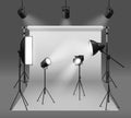 Studio spotlights. Realistic photo studio with professionals equipment, floodlight, cyclorama and tripod, soft box light Royalty Free Stock Photo