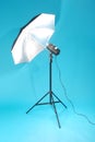 Studio strobe isolated on the blue background Royalty Free Stock Photo