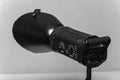 Studio Strobe Light with Reflector on Gray Background Royalty Free Stock Photo