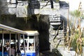 The studio tram tour passes an old tram as it enters King Kong 360 3-D