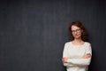 Portrait of confident young woman holding arms folded Royalty Free Stock Photo