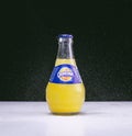 Studioshot of Orangina orange lemonade Royalty Free Stock Photo