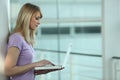 Studious woman using laptop