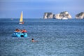 Studland, Dorset, England - June 01 2018: Holidaymakers swimming