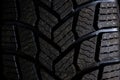 Studless snow tire close up macro shot landscape Royalty Free Stock Photo