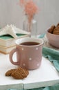 A study break: a cup of tea and a bowl of cookies Royalty Free Stock Photo