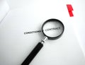 Study conditions of contract with magnifier Royalty Free Stock Photo