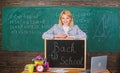 Study and education. Modern school. Knowledge day. teacher with alarm clock at blackboard. Time. Back to school Royalty Free Stock Photo