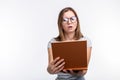 Study, education, people concept - female student is tired of learning classes, she is in gray shirt, standing with