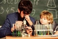 Study educational activity through experience. I love study in school. Teacher and boy in chemical laboratory. Study Royalty Free Stock Photo