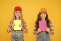 Study group can help solidify and clarify material. Kids girls with books study together. Back to school. Learning Royalty Free Stock Photo