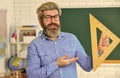 Study mathematics. Mature bearded teacher in glasses. Education concept. Talented pedagogue. Private lesson. Back to Royalty Free Stock Photo