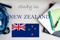 Study in New Zealand. Background with notepad, laptop and backpack. Education concept Royalty Free Stock Photo