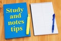 Study and Notes Tips with retro old blue book with highlighter marker on a desk