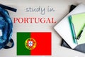 Study in Portugal. Background with notepad, laptop and backpack. Education concept Royalty Free Stock Photo