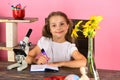 Study room and beauty concept. Schoolgirl at her desk Royalty Free Stock Photo