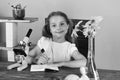 Study room and beauty concept. Schoolgirl at her desk Royalty Free Stock Photo