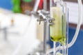 Separating by filtration and evaporation condensation the component substances from liquid mixture in Lab. Royalty Free Stock Photo