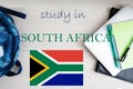 Study in South Africa. Background with notepad, laptop and backpack. Education concept Royalty Free Stock Photo