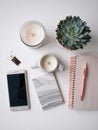 Organized Desk Flat Lay With Study Essentials and Calming Candle on a Light Background Featuring a Succulent and Royalty Free Stock Photo