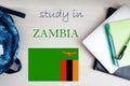 Study in Zambia. Background with notepad, laptop and backpack. Education concept Royalty Free Stock Photo