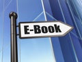 Studying concept: sign E-Book on Building background Royalty Free Stock Photo