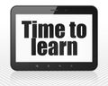 Studying concept: Tablet Pc Computer with Time to Learn on display Royalty Free Stock Photo