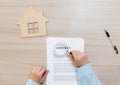 Studying a contract for the purchase or lease of real estate before signing. business and marketing. Royalty Free Stock Photo